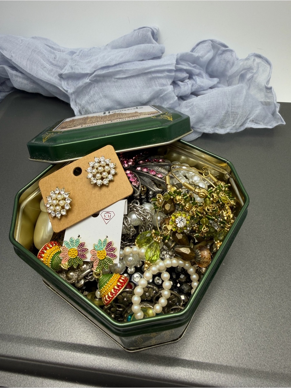 Vintage Harrods tin full of ready to Wear jewelry